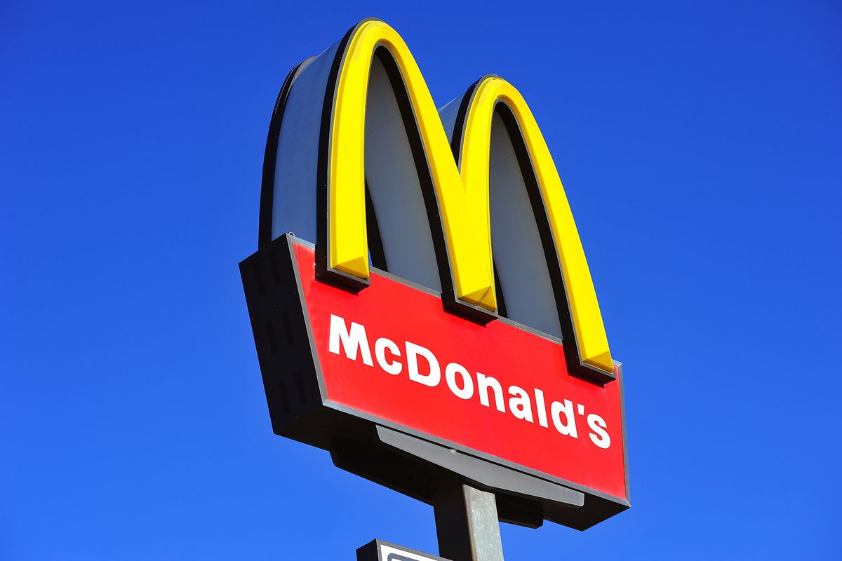 A photo of the golden arches over a McDonald’s restaurant.