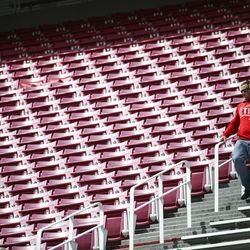 A Utah Utes fan makes his way down stairs during the Red-White game at Rice-Eccles Stadium in Salt Lake City on Saturday, April 13, 2019.