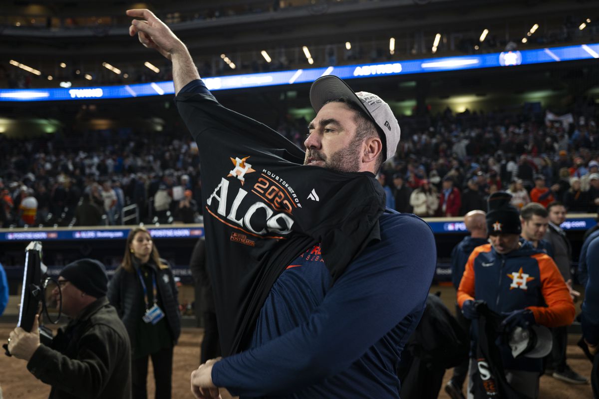 Justin Verlander #35 of the Houston Astros puts on an ALCS (American League Championship Series) tee shirt after his team’s victory in Game Four of the Division Series against the Minnesota Twins at Target Field on October 11, 2023 in Minneapolis, Minnesota.