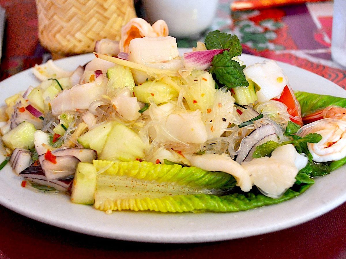 A photo of a dish consisting of romaine lettuce, cucumbers, romaine lettuce and other vegetables from Taste of Thailand