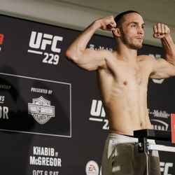 Tony Martin poses after making weight at UFC 229 weigh-ins.