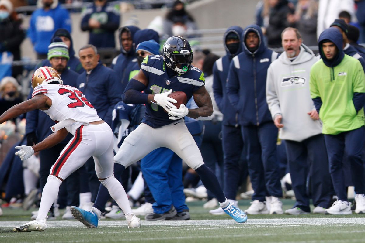 DK Metcalf #14 of the Seattle Seahawks makes a catch during the game against the San Francisco 49ers at Lumen Field on December 5, 2021 in Seattle, Washington.