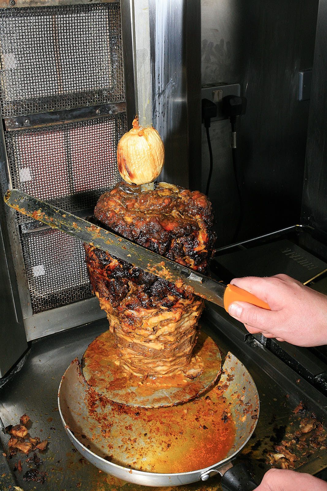 Shawarma turns on a traditional vertical spit