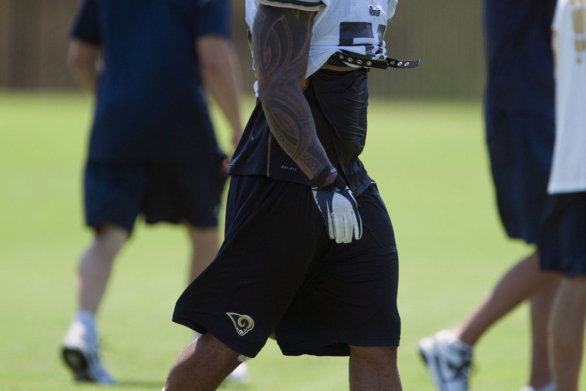 July 27, 2012; St. Louis, MO, USA; St. Louis Rams linebacker Aaron Brown (50) walks to the next drill during training camp at ContinuityX Training Center. Mandatory Credit: Jeff Curry-US PRESSWIRE