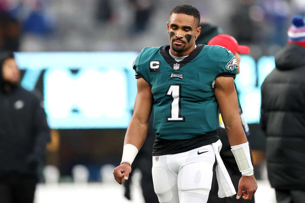 Jalen Hurts #1 of the Philadelphia Eagles looks on as he walks off the field after his team’s loss against the New York Giants at MetLife Stadium on November 28, 2021 in East Rutherford, New Jersey.