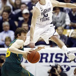 BYU's #10 Matt Carlino flies past Baylor's #5 Brady Heslip in the first half as BYU and Baylor play Saturday, Dec. 17, 2011 in the Marriott Center in Provo. Baylor won 86-83.