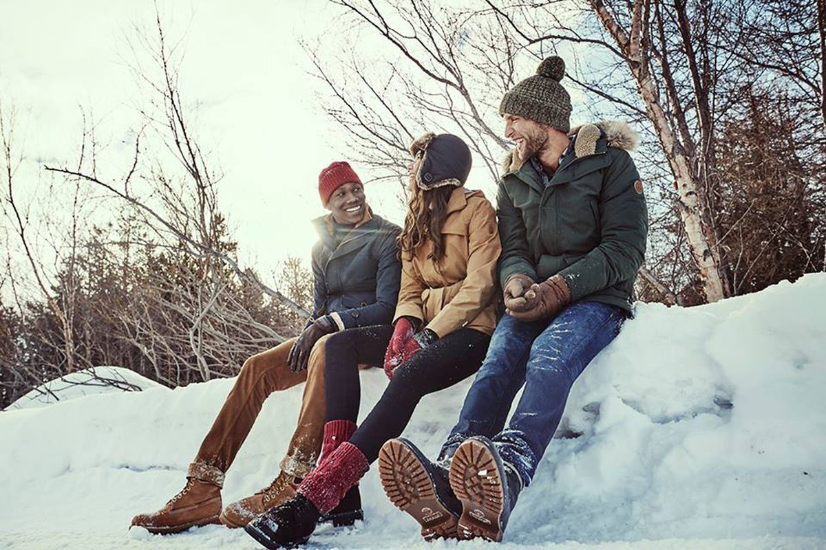 Group wearing Timberland Boots in snow