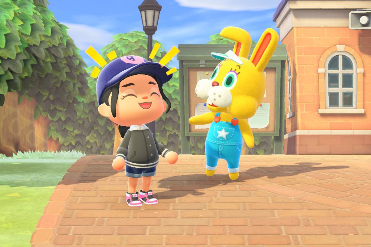 An Animal Crossing rit aux côtés d'un lapin jaune qui saute en salopette
