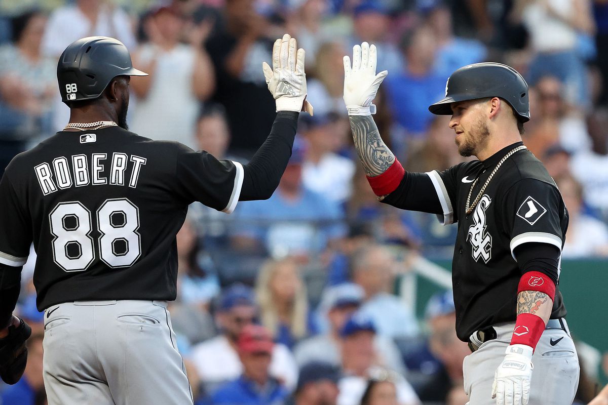 Yasmani Grandal #24 of the Chicago White Sox is congratulated by Luis Robert #88 after hitting a 2-run home run during the 4th inning of the game against the Kansas City Royals at Kauffman Stadium on May 16, 2022 in Kansas City, Missouri.