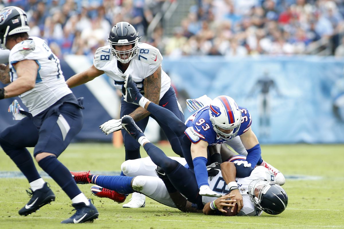 Buffalo Bills defensive end Trent Murphy sacks Tennessee Titans quarterback Marcus Mariota during a game between the Tennessee Titans and the Buffalo Bills on October 6, 2019, at Nissan Stadium in Nashville, Tennessee.