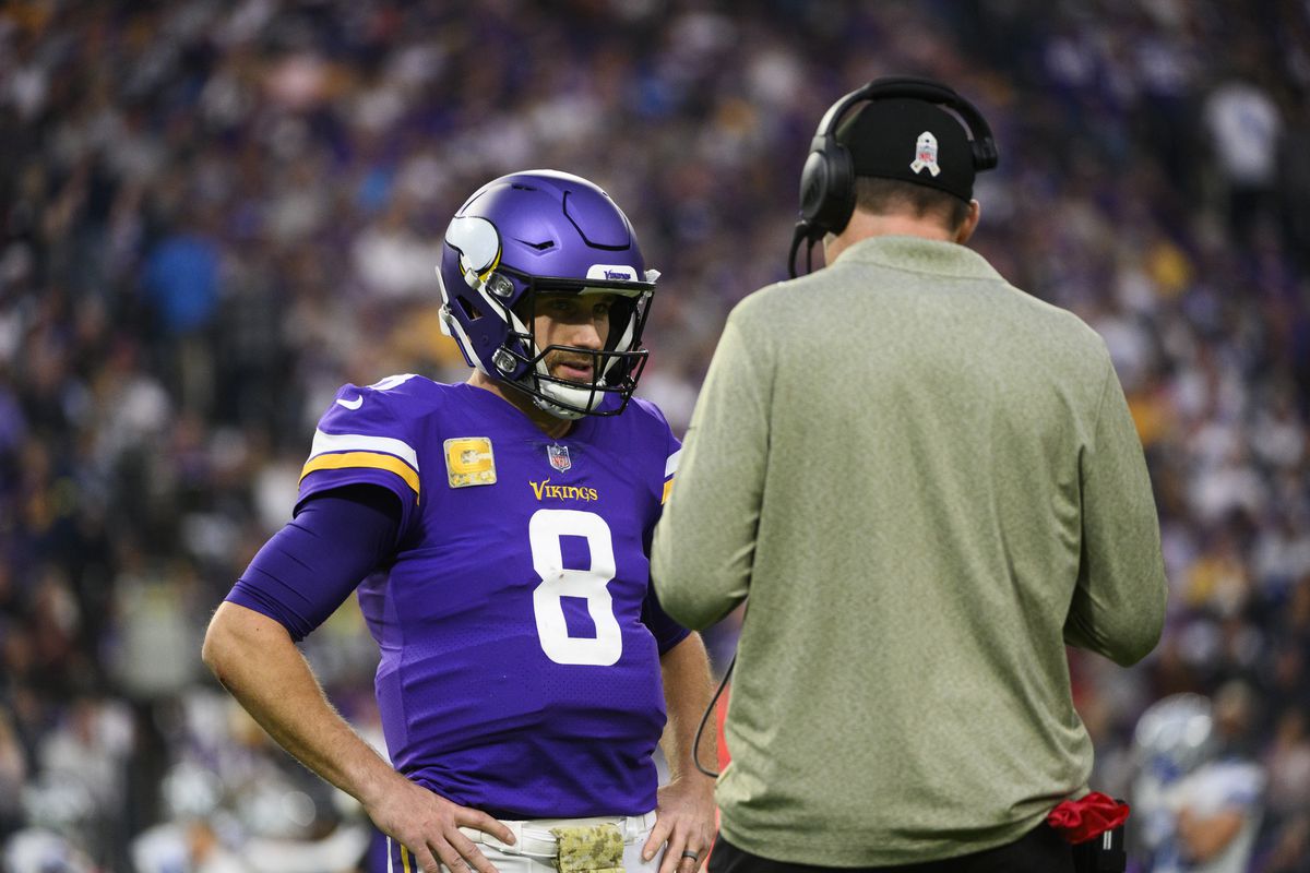 Kirk Cousins #8 of the Minnesota Vikings speaks with head coach Kevin O’Connell in the second quarter of the game against the Dallas Cowboys at U.S. Bank Stadium on November 20, 2022 in Minneapolis, Minnesota.