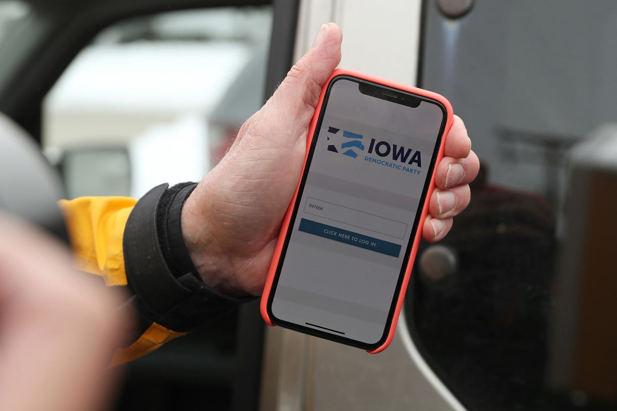 A phone where the screen reads: Iowa Democratic Party.