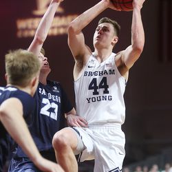 Brigham Young Cougars guard Connor Harding (44) goes up for a shot with San Diego Toreros guard Finn Sullivan (23) defending as the BYU Cougars and San Diego Toreros play in WCC tournament action at the Orleans Arena in Las Vegas on Saturday, March 9, 2019. San Diego won 80-57.