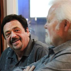 Jay Osmond, left, listens to his brother, Merrill Osmond, during a break while working on a record at Rock Canyon Studios in Provo on Tuesday, June 26, 2018.
