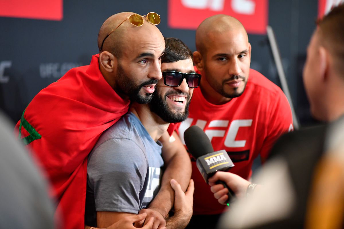 Ottman Azaitar along with Zubaira Tukhugov and Abu Azaitar at UFC 242.