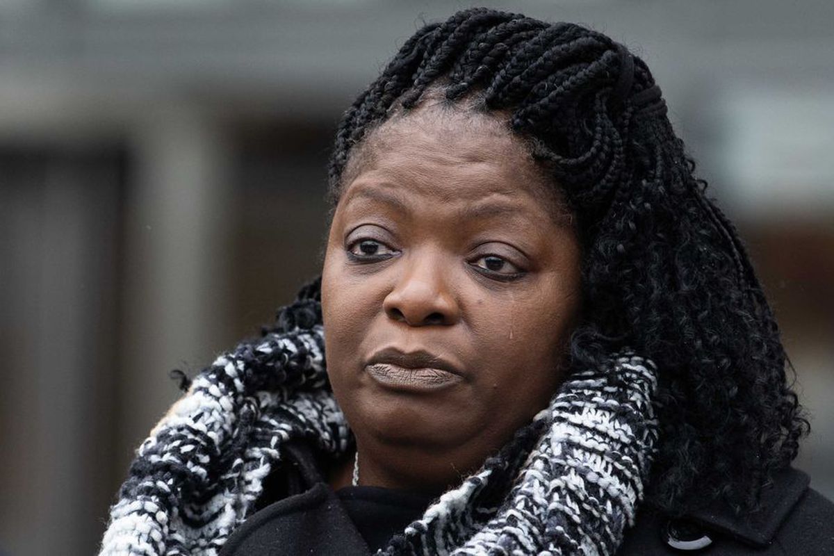 Anjanette Young tears up Wednesday as she talks about a botched Chicago police raid of her house in February 2019.