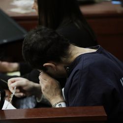 Dr. Larry Nassar wipes his face after a gymnast gave her victim impact statement during the seventh day of his sentencing hearing Wednesday, Jan. 24, 2018, in Lansing, Mich. Nassar has admitted sexually assaulting athletes when he was employed by Michigan State University and USA Gymnastics, which is the sport's national governing organization and trains Olympians. (AP Photo/Carlos Osorio)