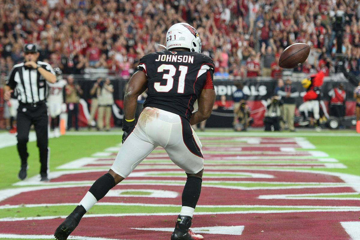 Arizona Cardinals running back David Johnson celebrates a touchdown catch against the Atlanta Falcons during the second half at State Farm Stadium.