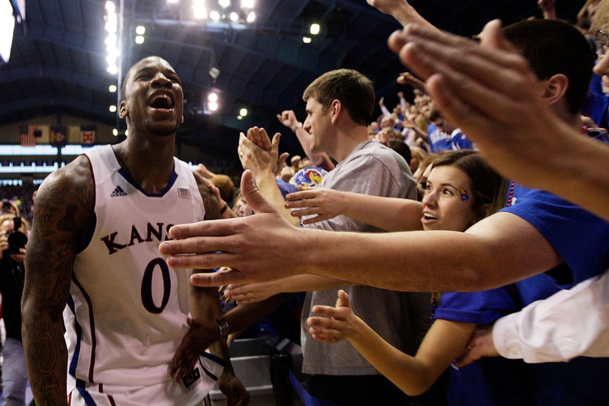 LAWRENCE, KS - FEBRUARY 25:  Thomas Robinson #0 of the Kansas Jayhawks reacts after the Jayhawks defeated the Missouri Tigers 87-86 to win the game on February 25, 2012 at Allen Fieldhouse in Lawrence, Kansas.  (Photo by Jamie Squire/Getty Images)