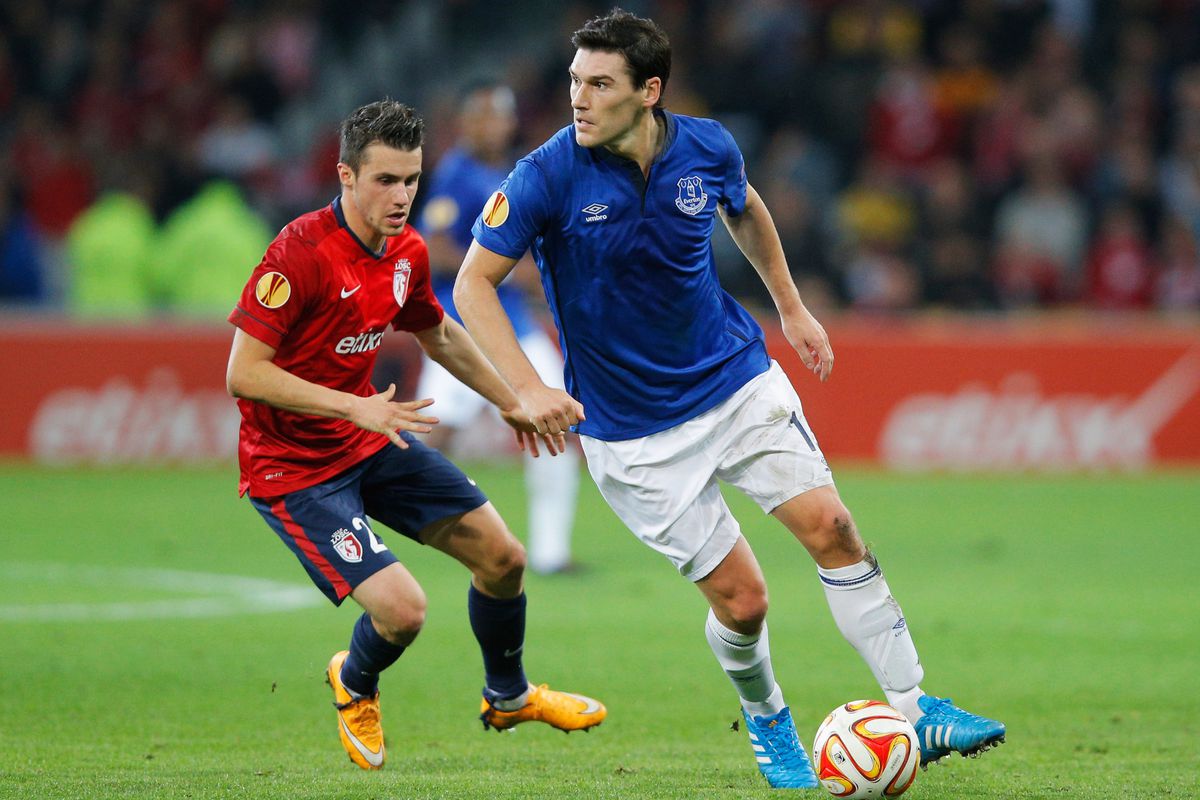 Gareth Barry looks for a teammate to pass to.