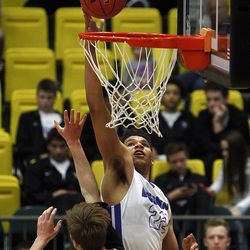 Bingham's Yoeli Childs (22) places the ball near the rim in the first round of the 5A boys basketball tournament against Viewmont at the UCCU Events Center in Orem, Tuesday, March 1, 2016.