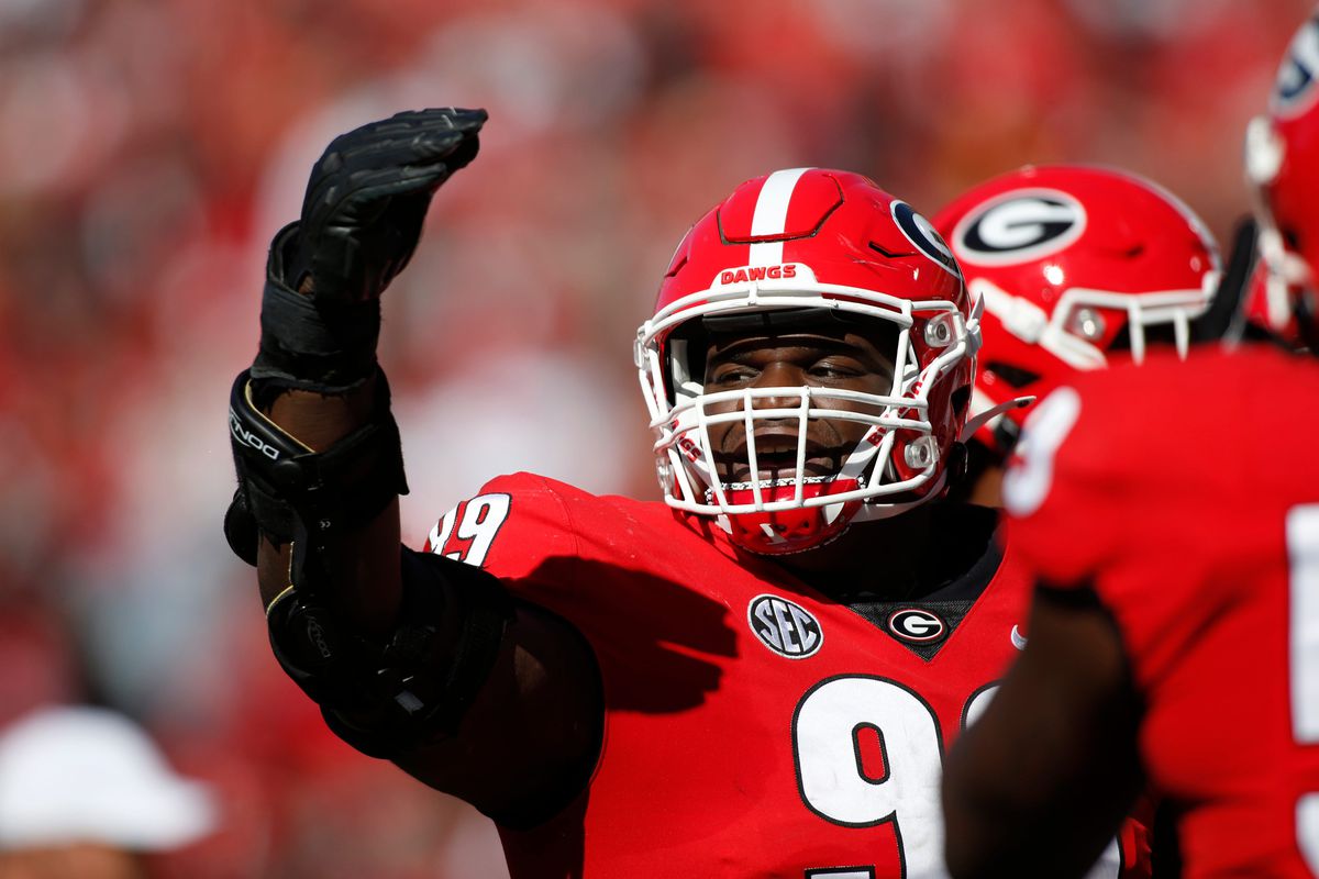 Georgia defensive lineman Jordan Davis celebrates after getting his first career touchdown during the first half of a NCAA college football game between Charleston Southern and Georgia in Athens, Ga., on Saturday, Nov. 20, 2021.