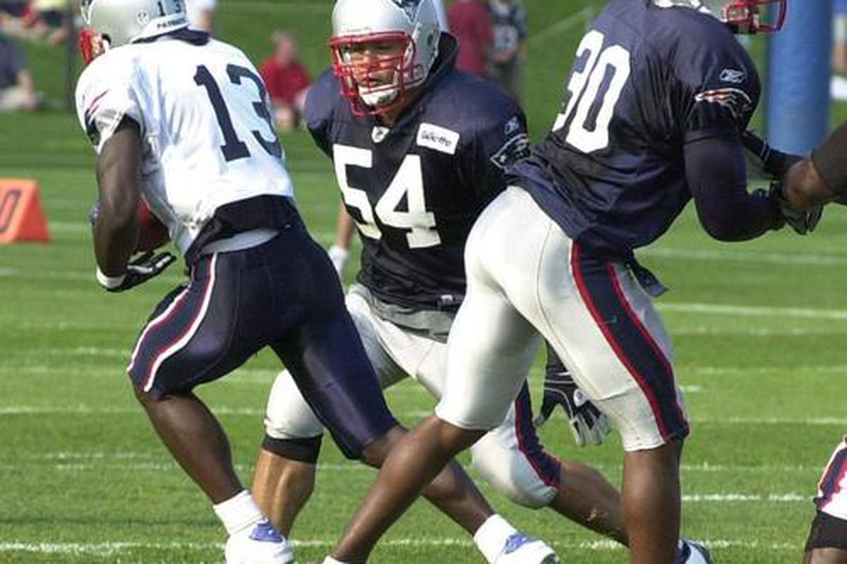 <em>LB Tedy Bruschi (54) makes a tackle on WR Joey Galloway (13) during Sunday's afternoon practice.</em>