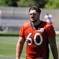 Denver Broncos guard Connor McGovern takes the field on the first day of Broncos camp.