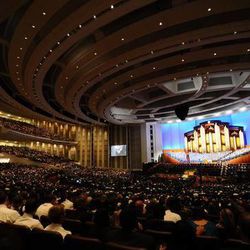 Members of The Church of Jesus Christ of Latter-day Saints gather inside the Conference Center in Salt Lake City during a session of general conference.