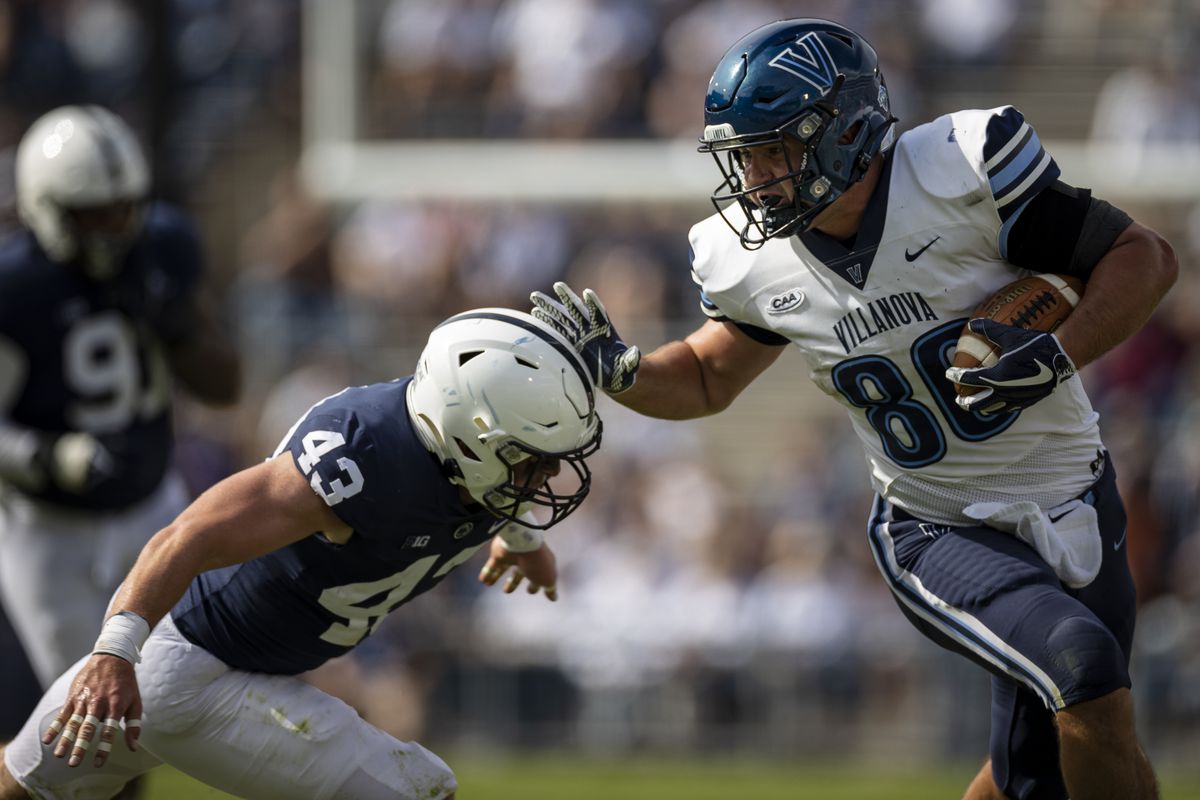 Todd Summers #86 of the Villanova Wildcats carries the ball against Tyler Elsdon #43 of the Penn State Nittany Lions during the second half at Beaver Stadium on September 25, 2021 in State College, Pennsylvania.