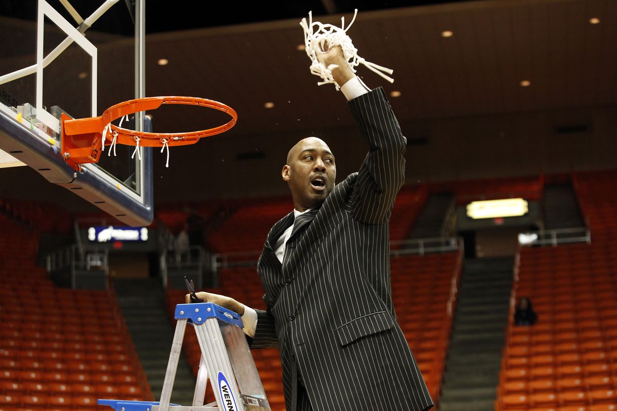 Mar 15, 2014; El Paso, TX, USA; Tulsa Golden Hurricane head coach Danny Manning cheers to the crowd after cutting down the net after winning the Conference USA college basketball tournament over the Louisiana Tech Bulldogs 69-60 at Don Haskins Center