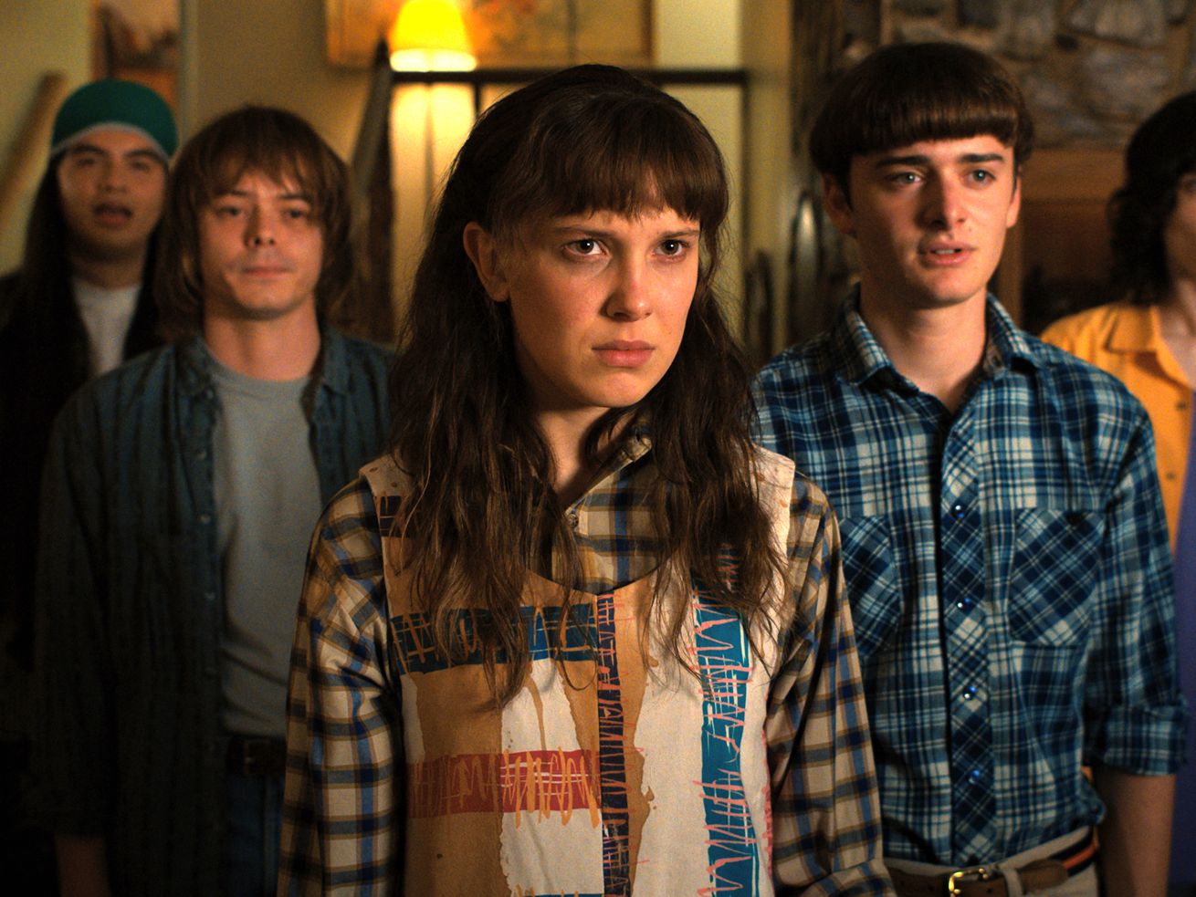 Eduardo Franco as Argyle, Charlie Heaton as Jonathan, Millie Bobby Brown as Eleven, Noah Schnapp as Will Byers, and Finn Wolfhard as Mike Wheeler in Stranger Things.