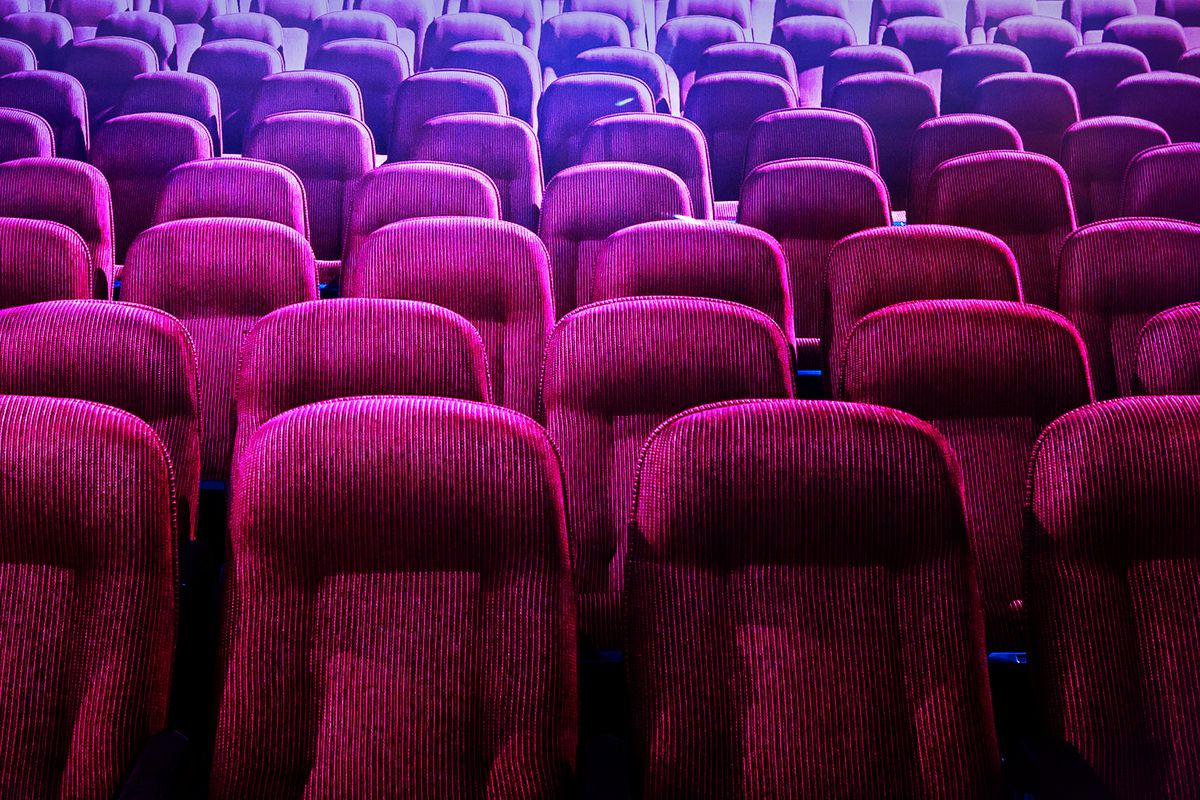 Rows of seats in a movie theater