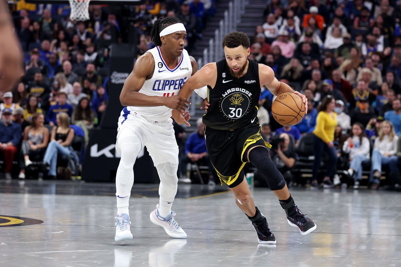 Steph Curry drives to the hoop during the Los Angeles Clippers v Golden State Warriors game.