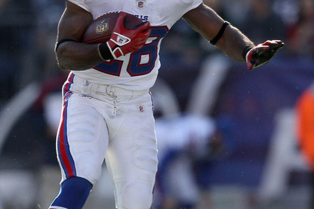 FOXBORO, MA - JANUARY 01:   C.J. Spiller #28 of the Buffalo Bills carries the ball in the firsr quarter against the New England Patriots on January 1, 2012 at Gillette Stadium in Foxboro, Massachusetts.  (Photo by Elsa/Getty Images)
