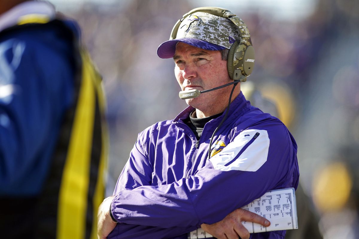 Is Zimmer holidng a Vikings Playoff Bingo card, or just his playcall sheet?  Hmm....