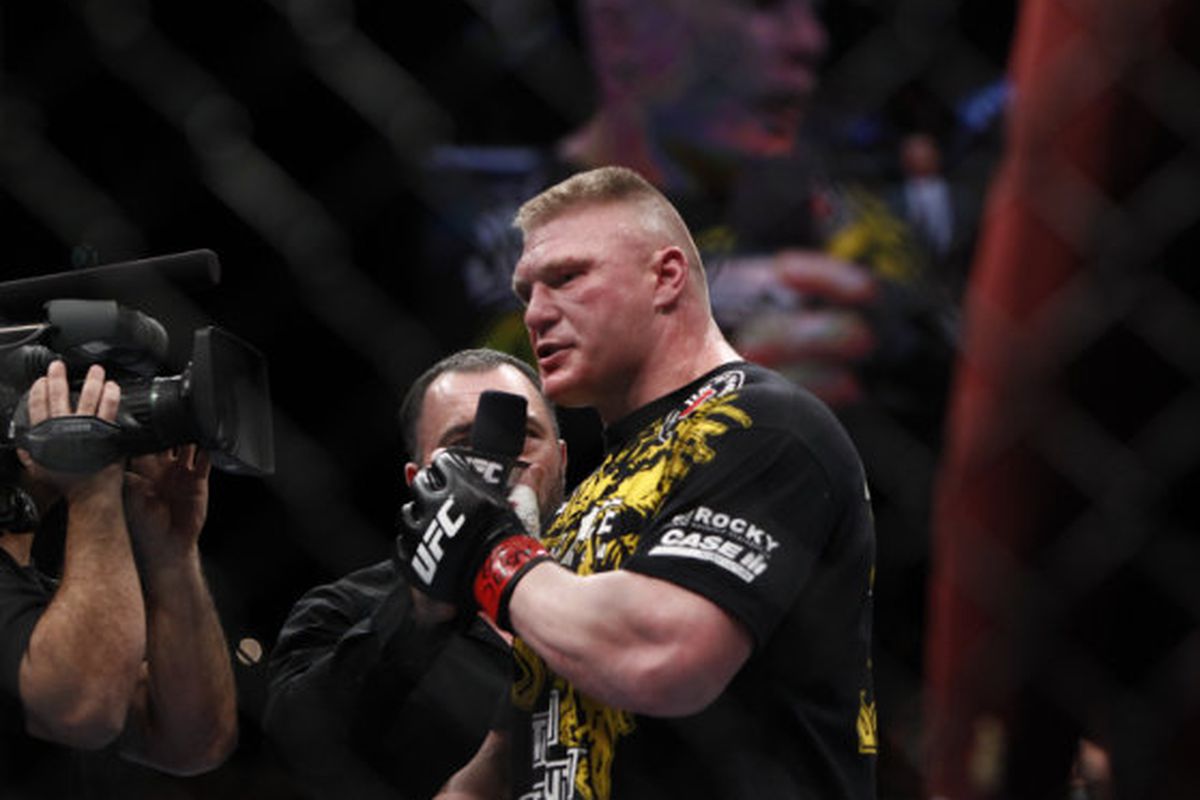 Brock Lesnar announcing his retirement from MMA. Photo by Esther Lin via MMAFighting.com.
