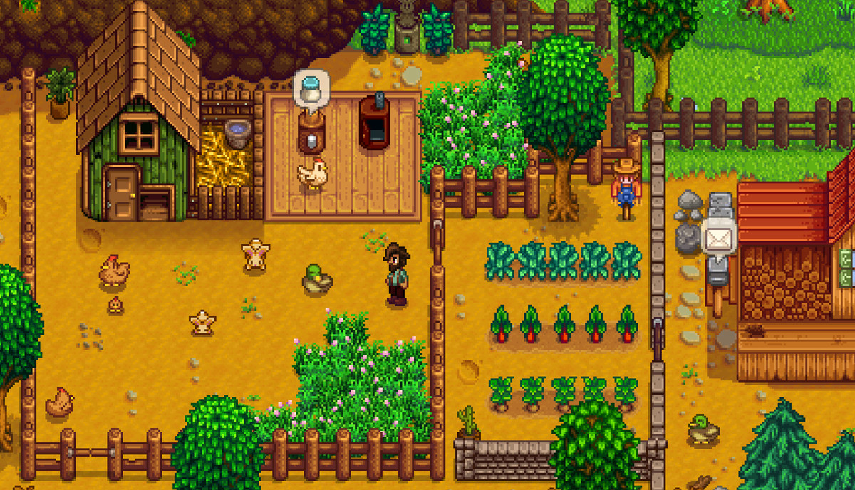 A screenshot from Stardew Valley, showing a person standing in a small ranch.