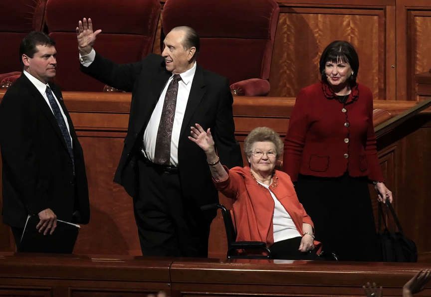 President Thomas S. Monson assists his wife, Frances, out of the Conference Center.