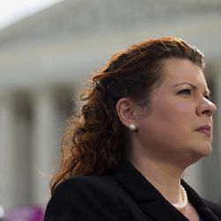 Lori Windham, the attorney representing Hobby Lobby, stands outside the Supreme Court in Washington, Monday, June 30, 2014, following the decision on the Hobby Lobby case. The Supreme Court says corporations can hold religious objections that allow them to opt out of the new health law requirement that they cover contraceptives for women.
