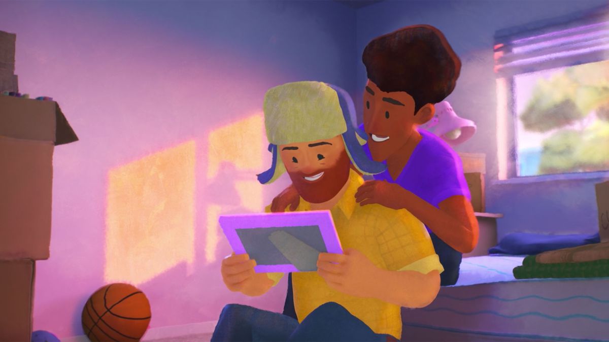 A red-bearded white man in a furry hat with earflaps and a dark-skinned man with poofy hair smile over a portrait of themselves together in Pixar’s short Out