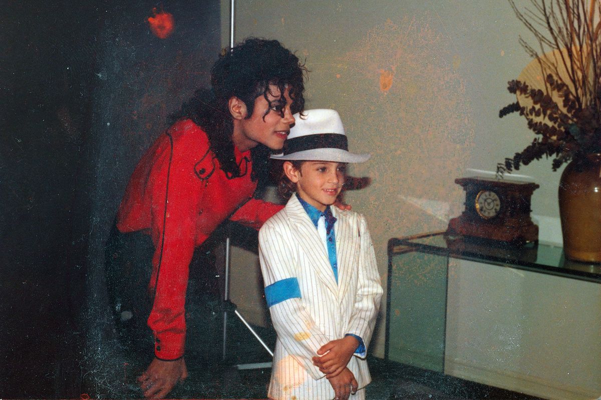Michael Jackson and a young boy.