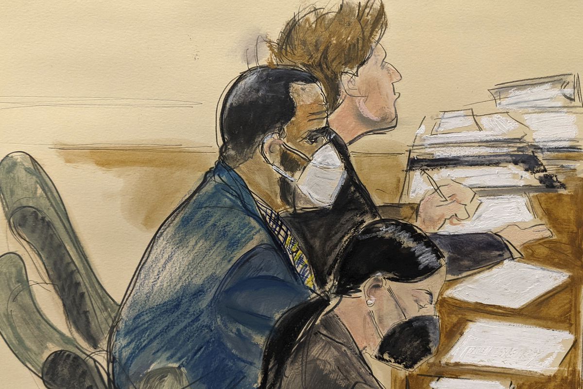 In this courtroom artist’s sketch R. Kelly, left, listens during his trial in New York, Thursday, Aug. 26, 2021. The 54-year-old Kelly has repeatedly denied accusations that he preyed on several alleged victims during a 30-year career highlighted by his mega hit “I Believe I Can Fly.”&nbsp;