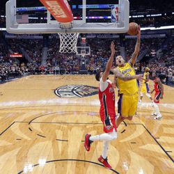 Los Angeles Lakers forward Kyle Kuzma shoots against New Orleans Pelicans forward Anthony Davis Wednesday, Feb. 14, 2018. The Pelicans won 139-117.