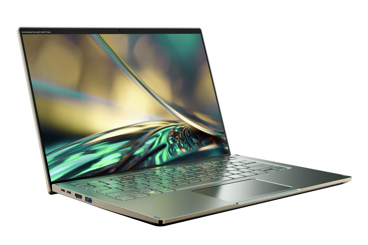 The Acer Swift 5 seen from the front angled to the left. The screen displays a close-up of a water stream.
