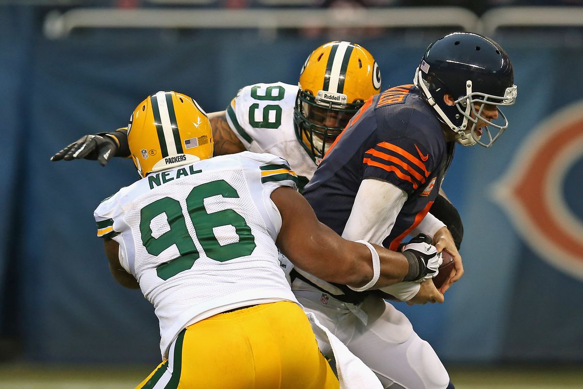 Mike Neal (96) and Jerel Worthy (99) sack Jay Cutler.