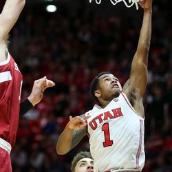 Utah Utes guard Justin Bibbins (1) lays it in during the game against the Stanford Cardinal at the Huntsman Center in Salt Lake City on Thursday, Feb. 8, 2018.