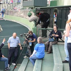 5:36 p.m. ESPN crew interviewing bleacher season-ticket holder Holly Swyers - 