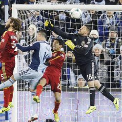 Real 'keeper Nick Rimando punches the ball away as Real Salt Lake and Sporting KC play Saturday, Dec. 7, 2013 in MLS Cup action. Sporting KC won in a shootout.
