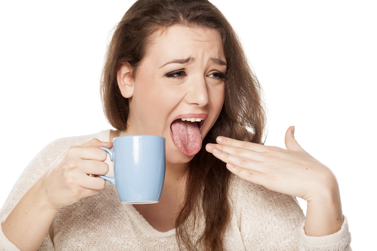 If this stock photo model is a time traveler, she may be disgusted by her terrible coffee from the 1800s.